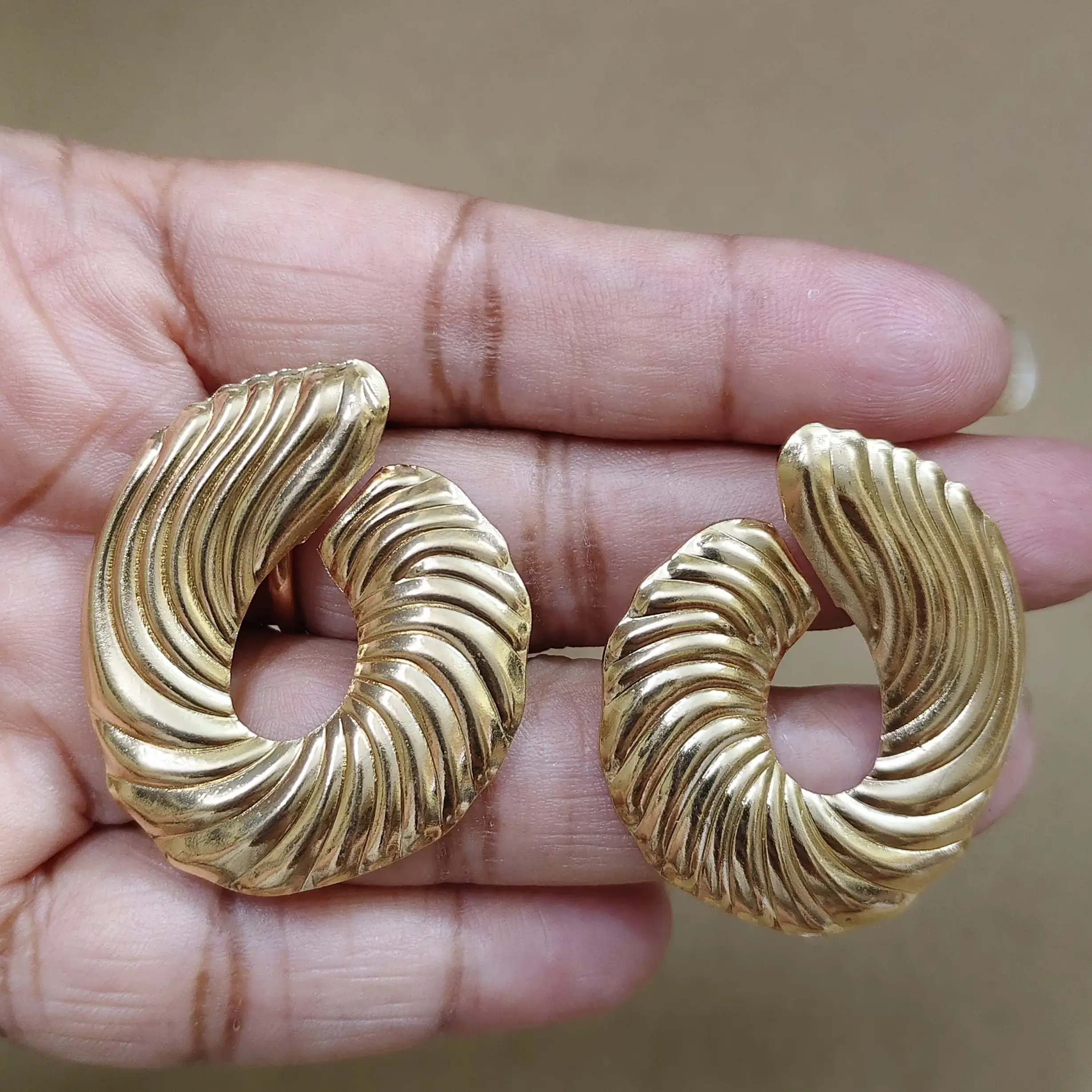 Golden designer Pasha earrings