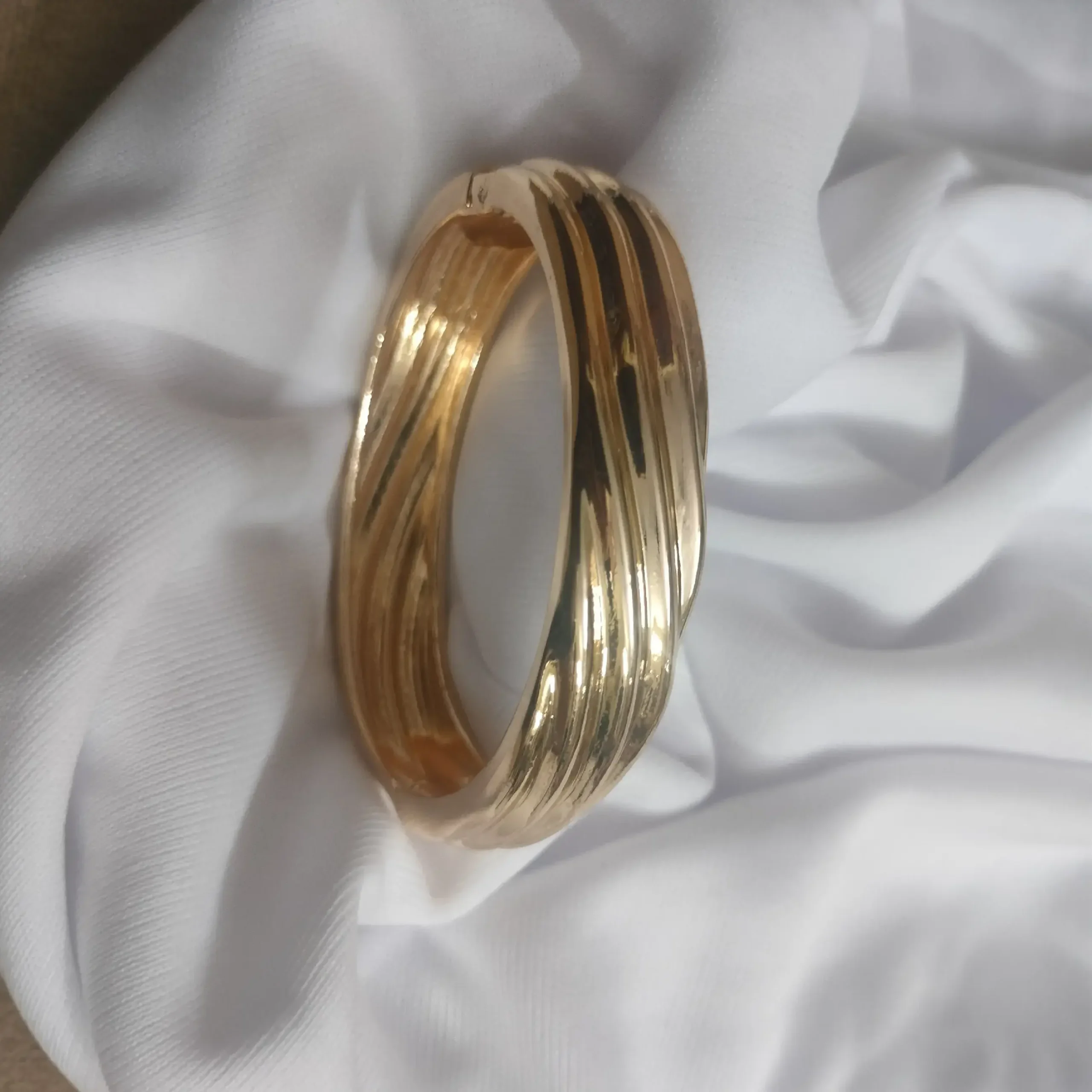 Golden Touched White Earrings With Golden Bangle