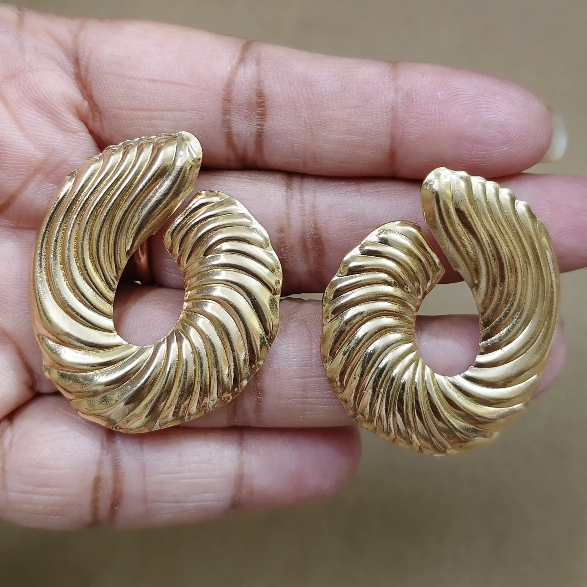 Golden designer Pasha earrings